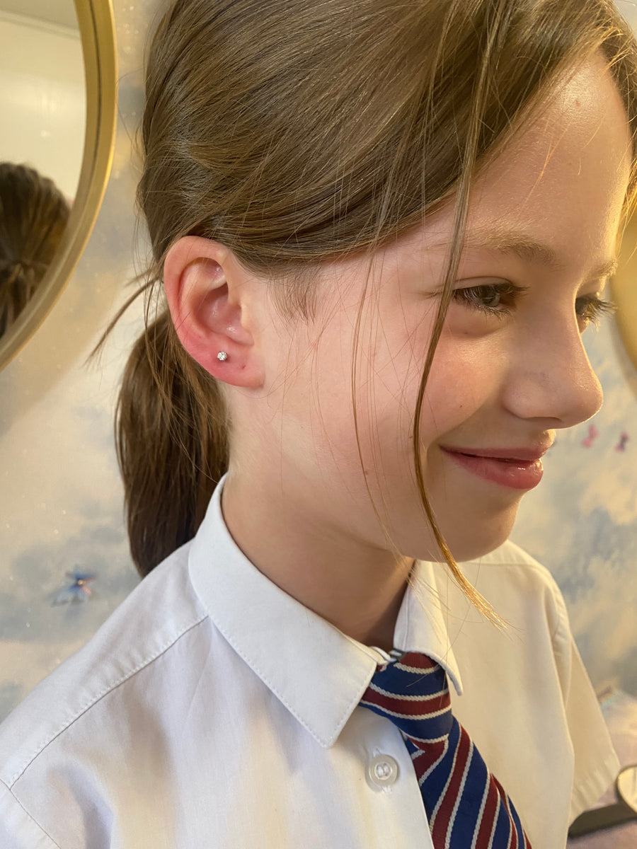 Lobes with needle – Bodylink piercing studio Maidstone.