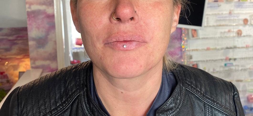 Middle of lip piercing