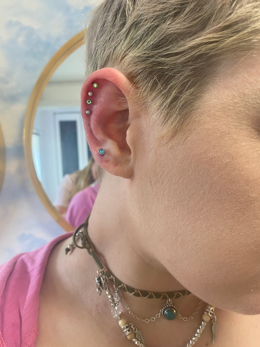 4 cartilage piercings – Bodylink piercing studio Maidstone.