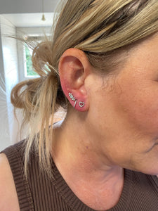 Ear piercings with needle
