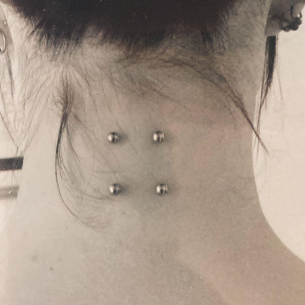 Double neck piercing