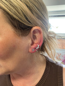 Ear piercings with needle